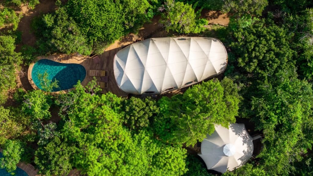 Aerial view of the tented suites and pool at Wild Coast Tented Lodge, Yala
