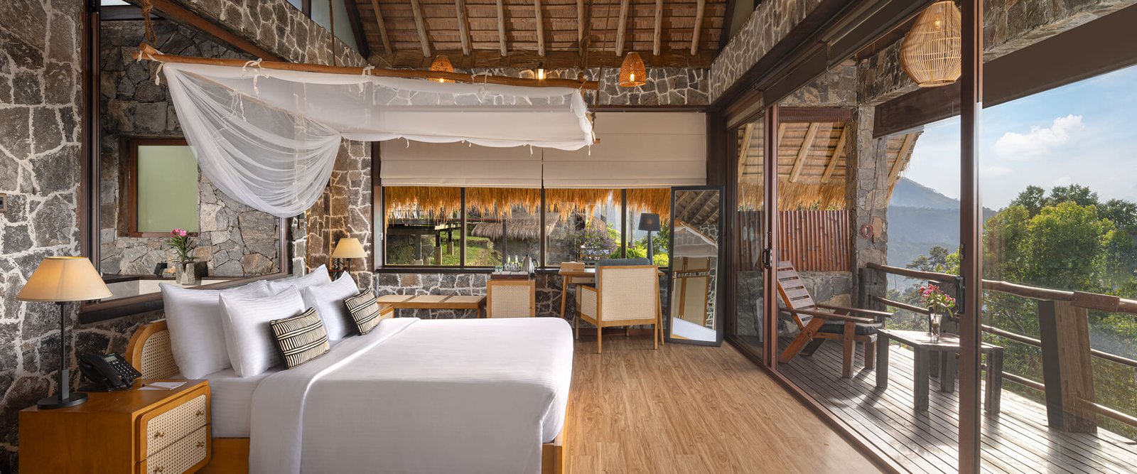 Bedroom with mountain views at 98 Acres Resort, Ella