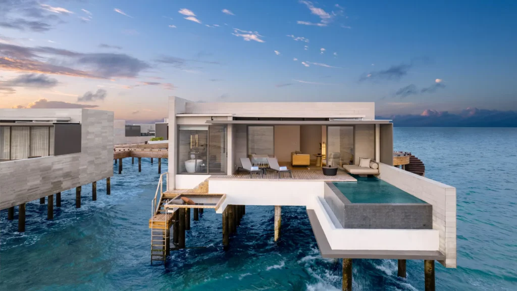 Modern overwater villa with a private pool at Alila Kothaifaru