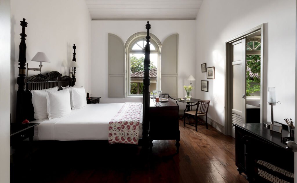 Bedroom with a four-poster bed at Amangalla, Galle Fort