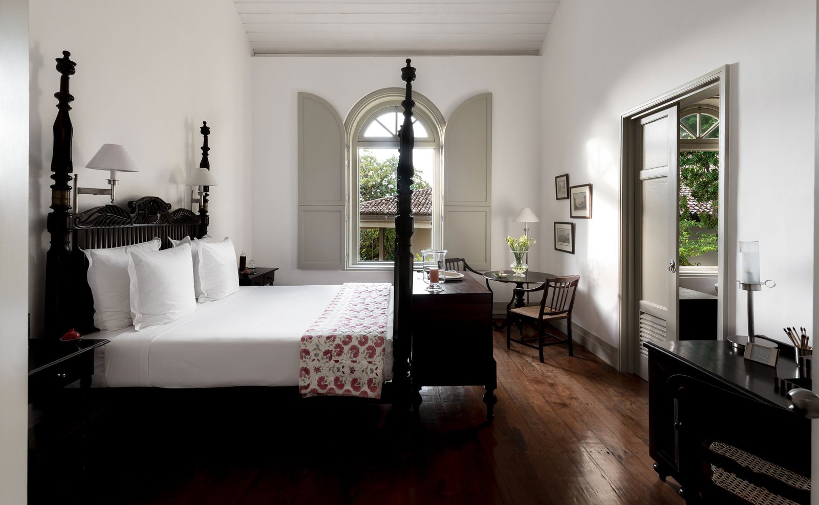 Bedroom with a four-poster bed at Amangalla, Galle Fort