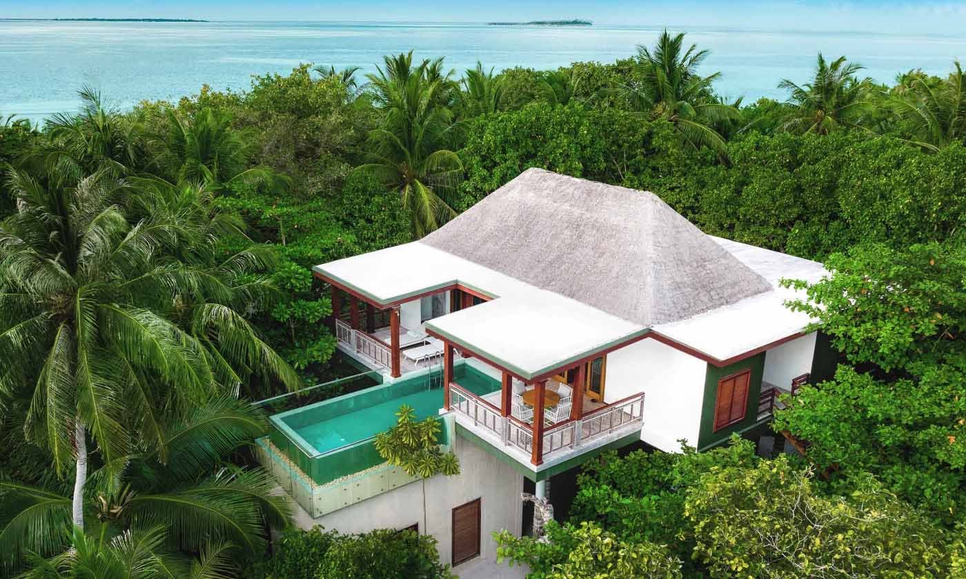 Villa with a private pool set among the trees at Amilla Maldives