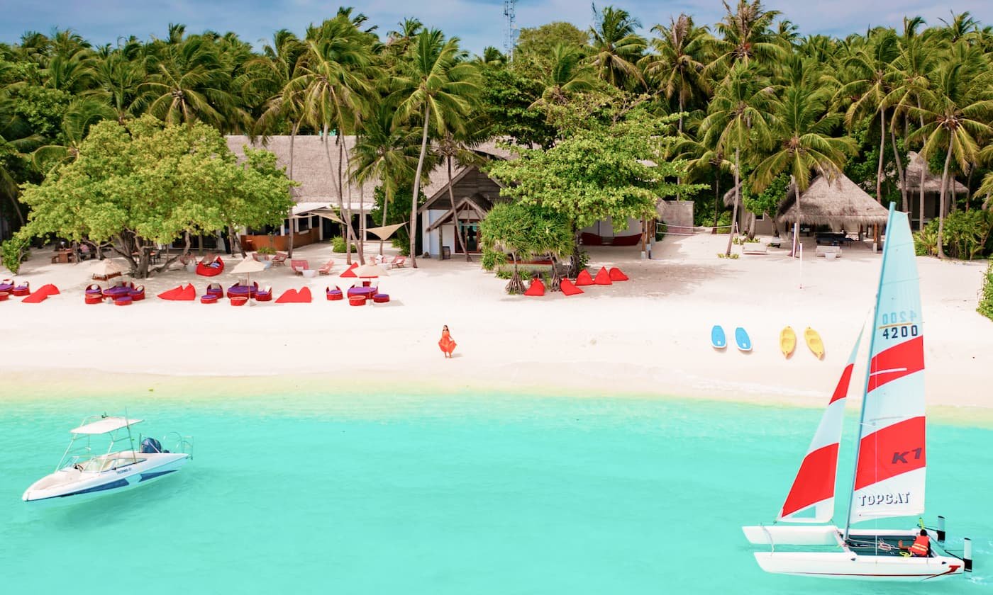 Catamaran and watersports on the beach at LUX South Ari Atoll