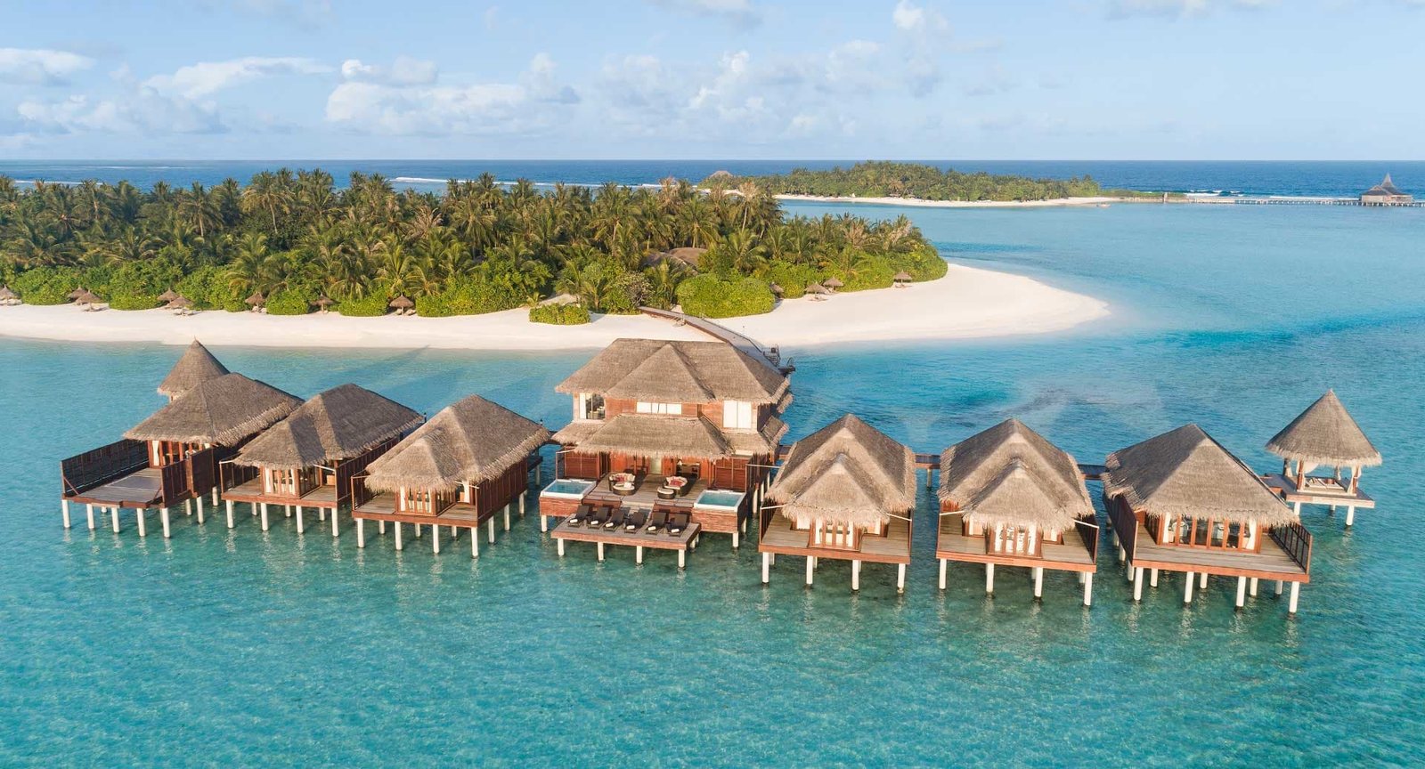 Overwater villas along the sandbank at Anantara Dhigu