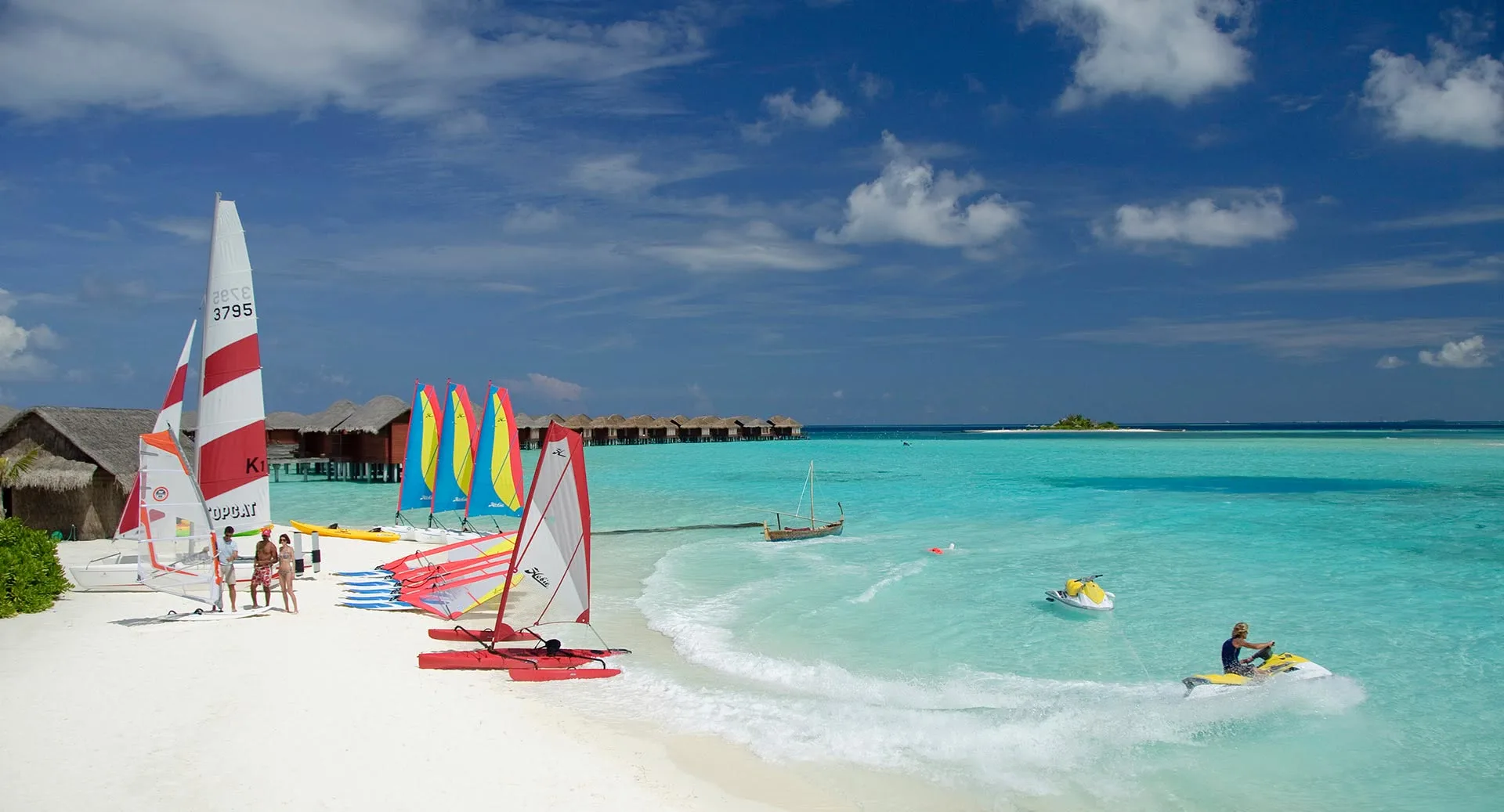 Sailing dinghies and watersports on the beach at Anantara Veli