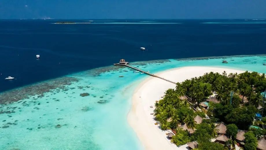 Aerial view of the island and reef at Banyan Tree Vabbinfaru