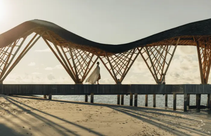 Curved timber beach pavilion at Banyan Tree Vabbinfaru