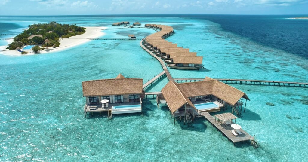 Overwater villas along the jetty at COMO Cocoa Island