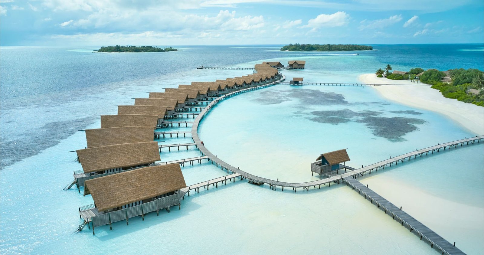 Aerial view of the overwater villas at COMO Cocoa Island