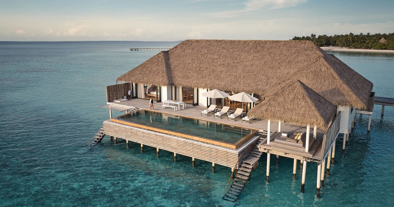 Overwater villa and deck at COMO Maalifushi, Thaa Atoll