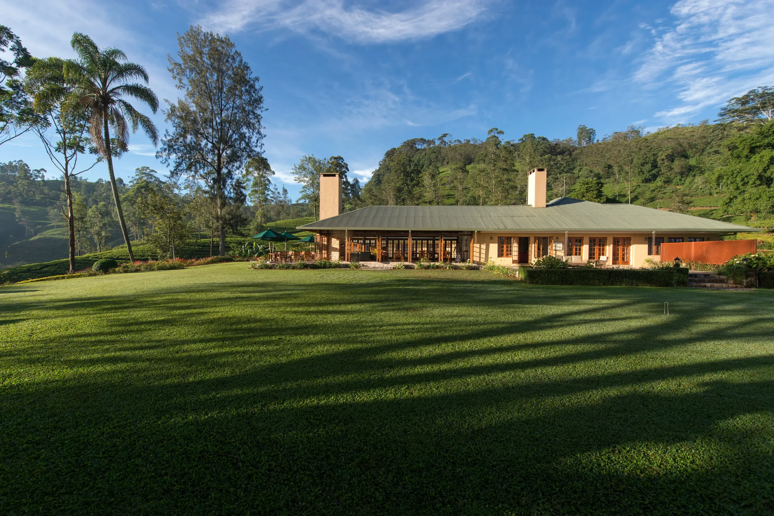 Colonial planters bungalow and lawn at Ceylon Tea Trails, Hatton