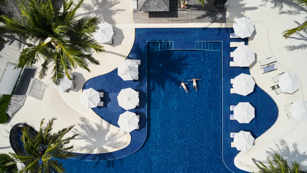 Aerial view of the resort pool at Conrad Maldives Rangali Island