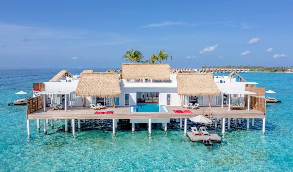 Overwater villas with private pools at Emerald Maldives Resort and Spa