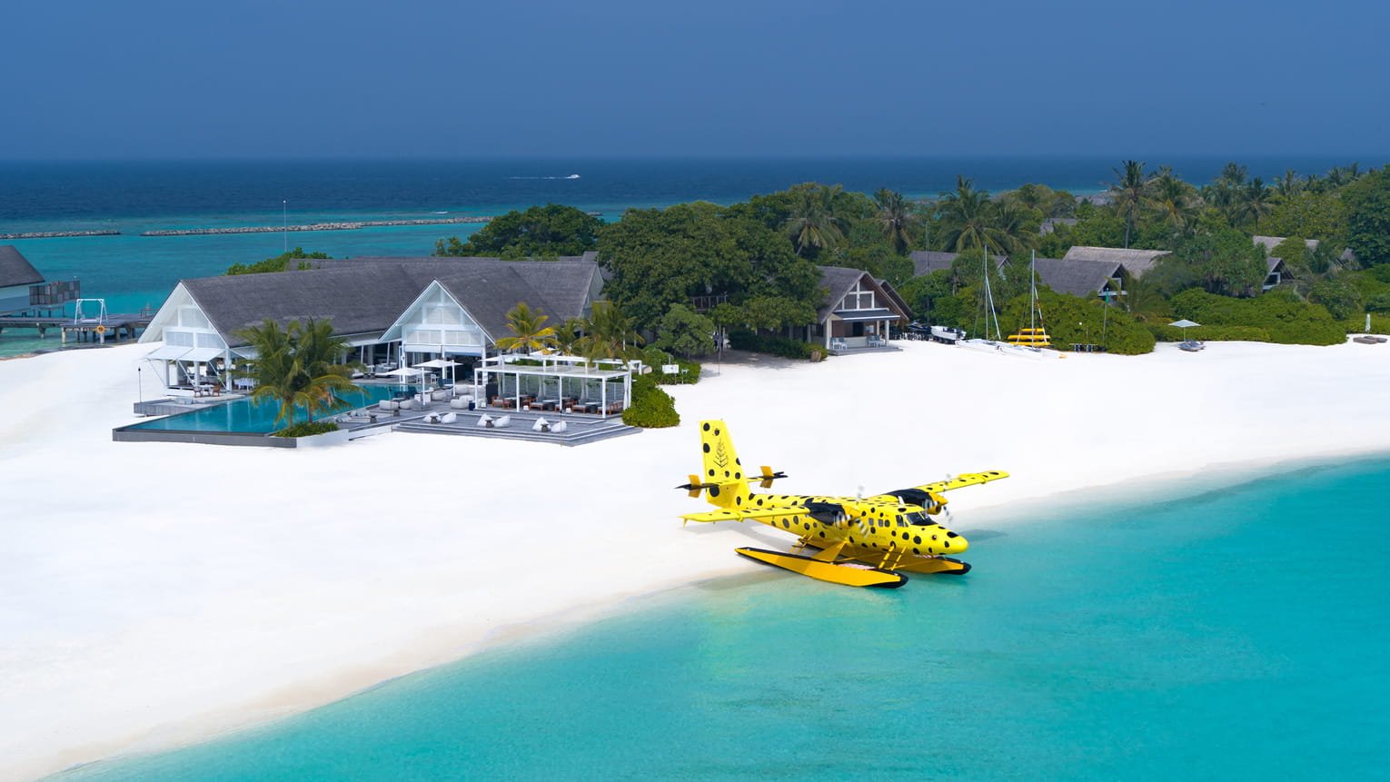 Seaplane on the beach at Four Seasons Resort Maldives at Landaa Giraavaru