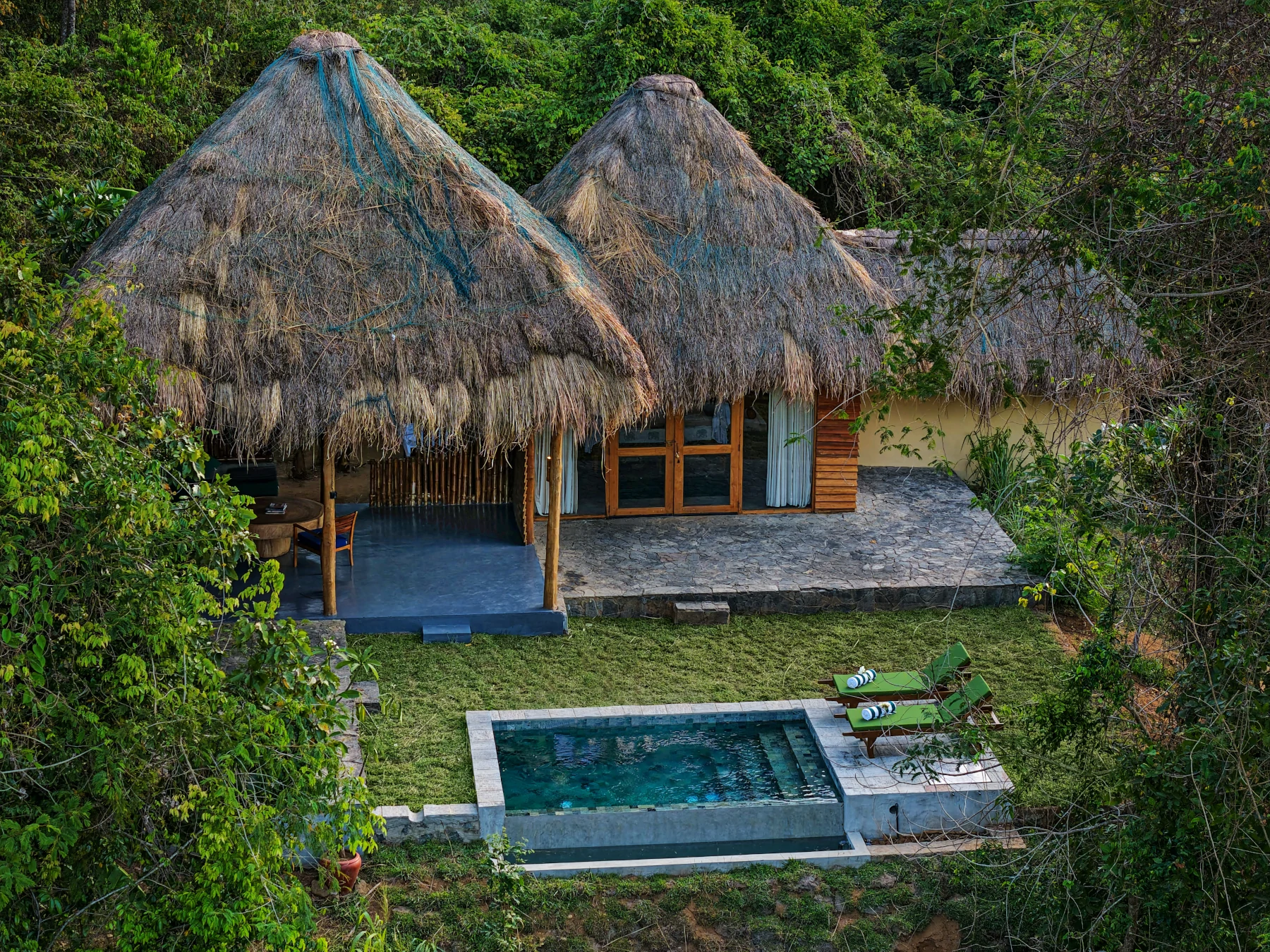 Thatched villa with a plunge pool at Gal Oya Lodge