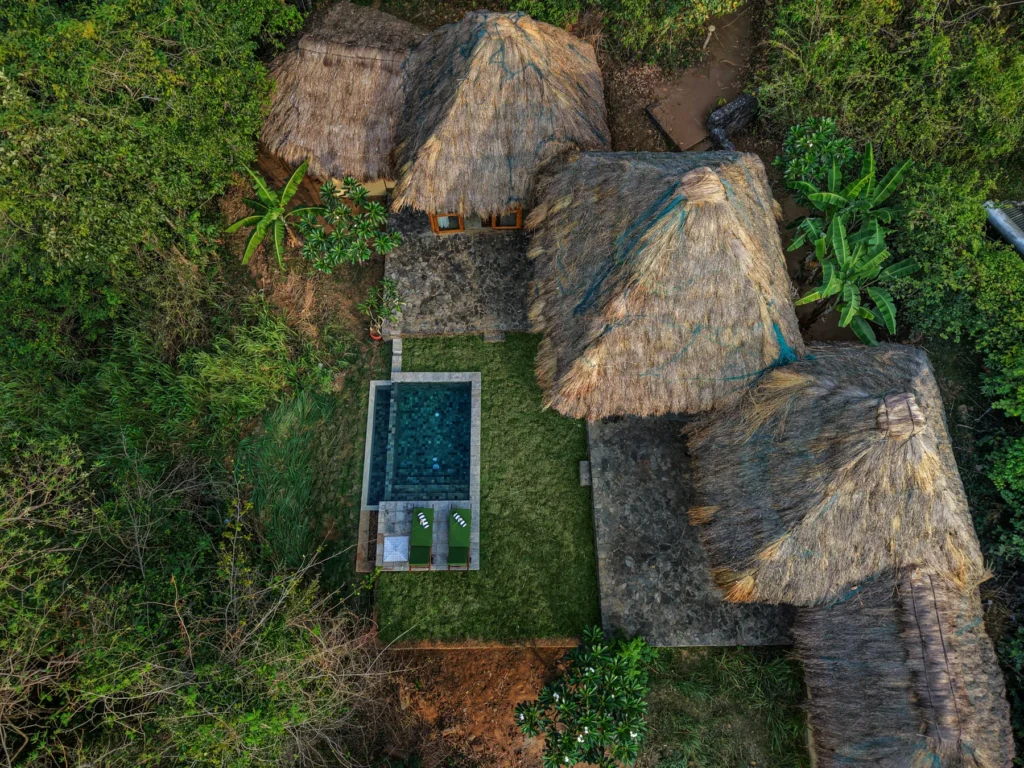 Aerial view of the bungalows and plunge pool at Gal Oya Lodge
