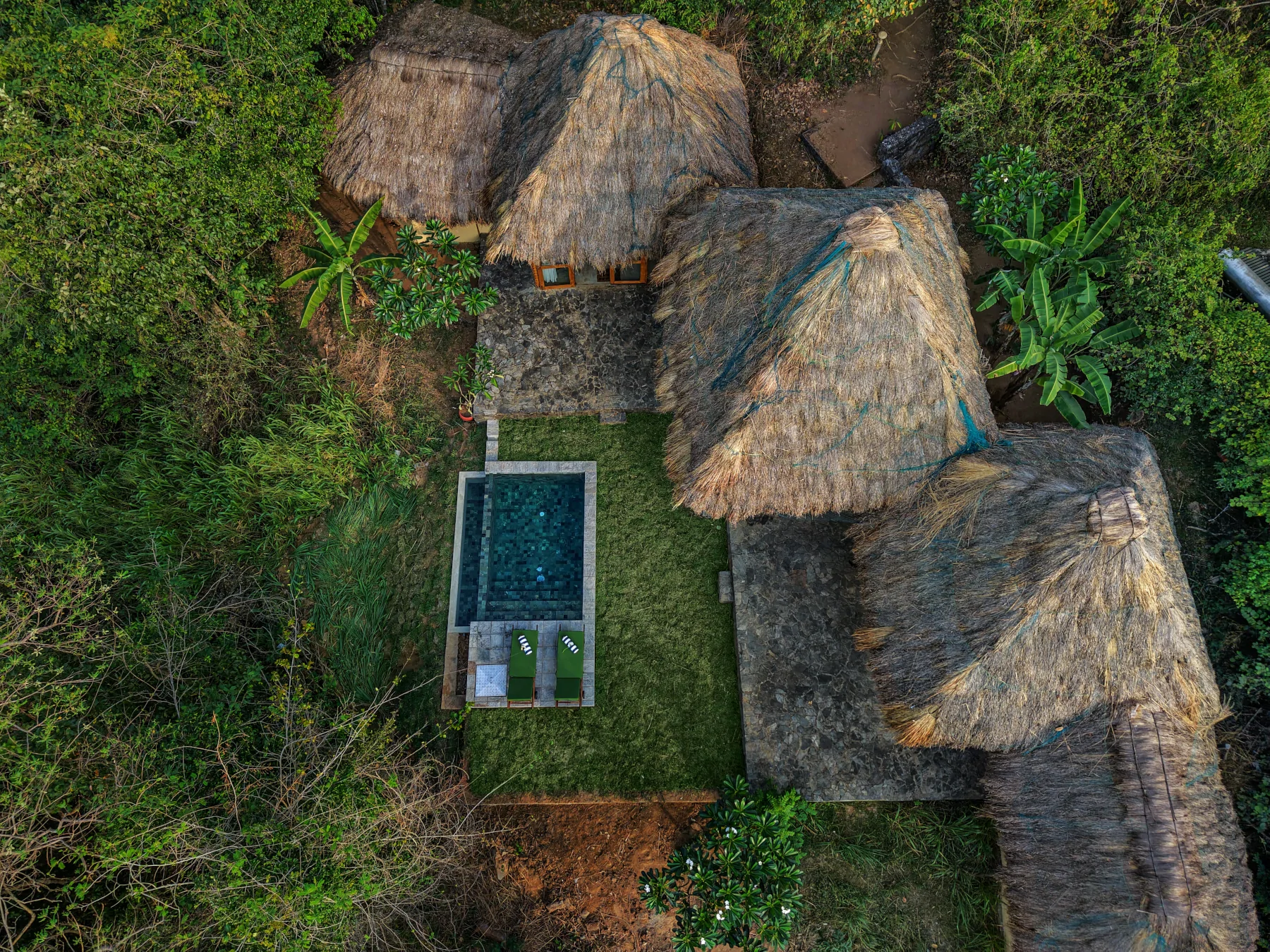 Aerial view of the bungalows and plunge pool at Gal Oya Lodge