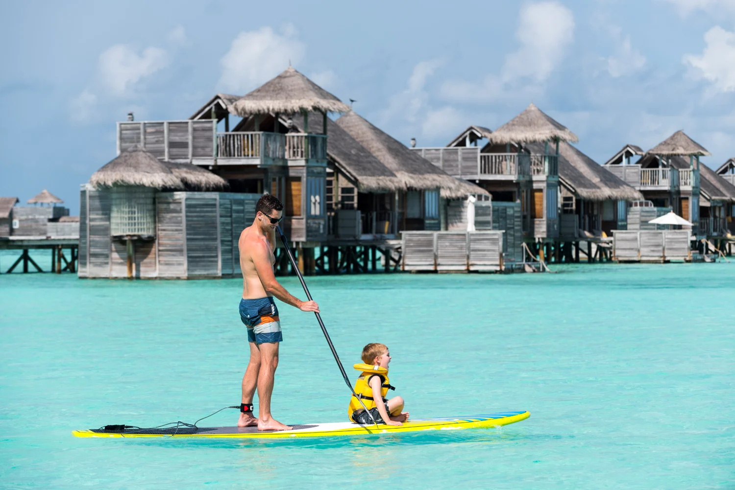 Paddleboarding past the overwater villas at Gili Lankanfushi