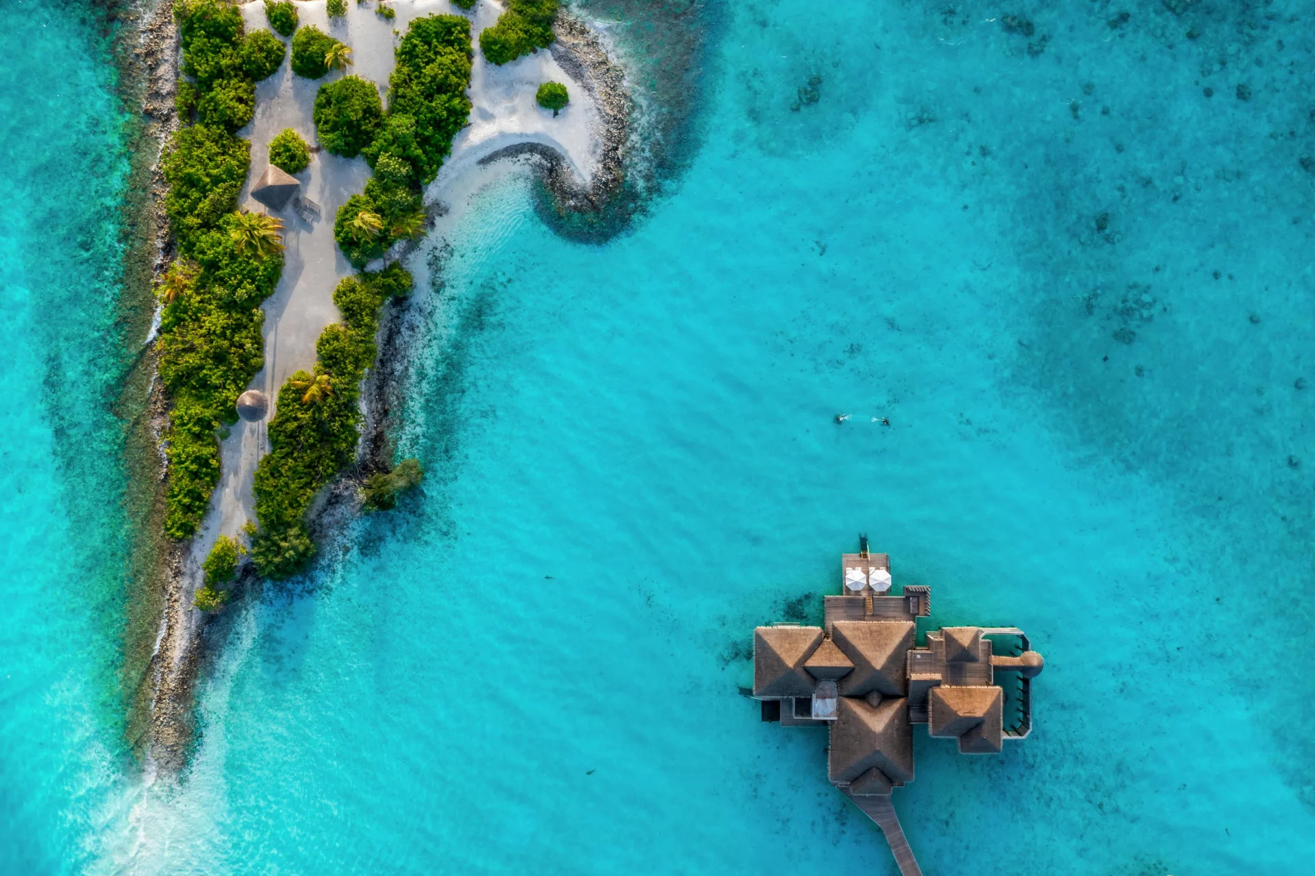 Aerial view of a private overwater residence at Gili Lankanfushi