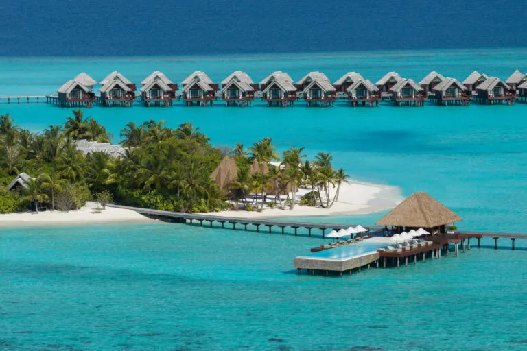 Aerial view of the villas and beach at Heritance Aarah, Raa Atoll