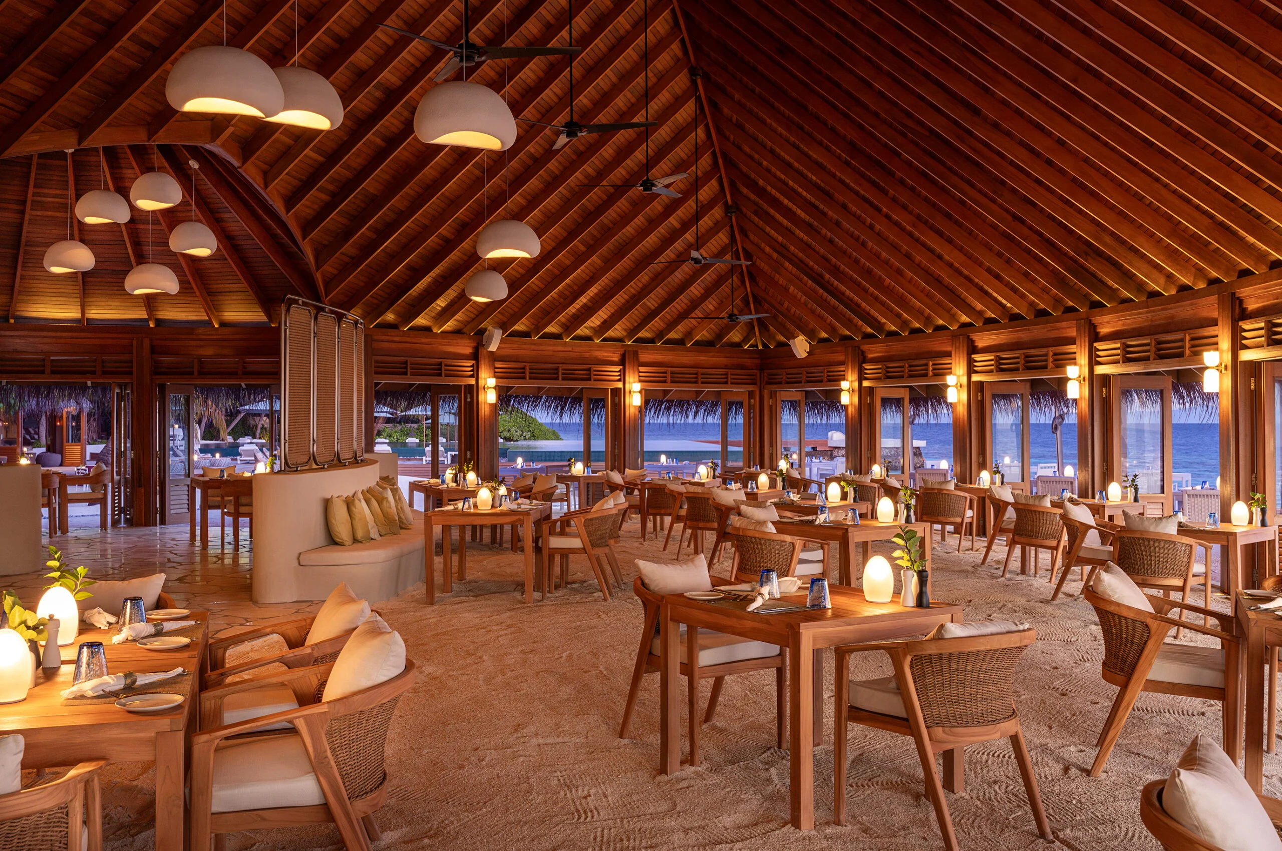 Timber restaurant interior at Huvafen Fushi