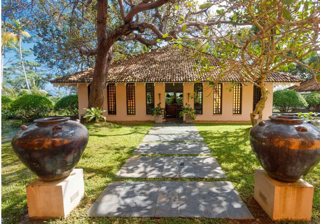 Colonial villa and garden path at Kahanda Kanda, Galle