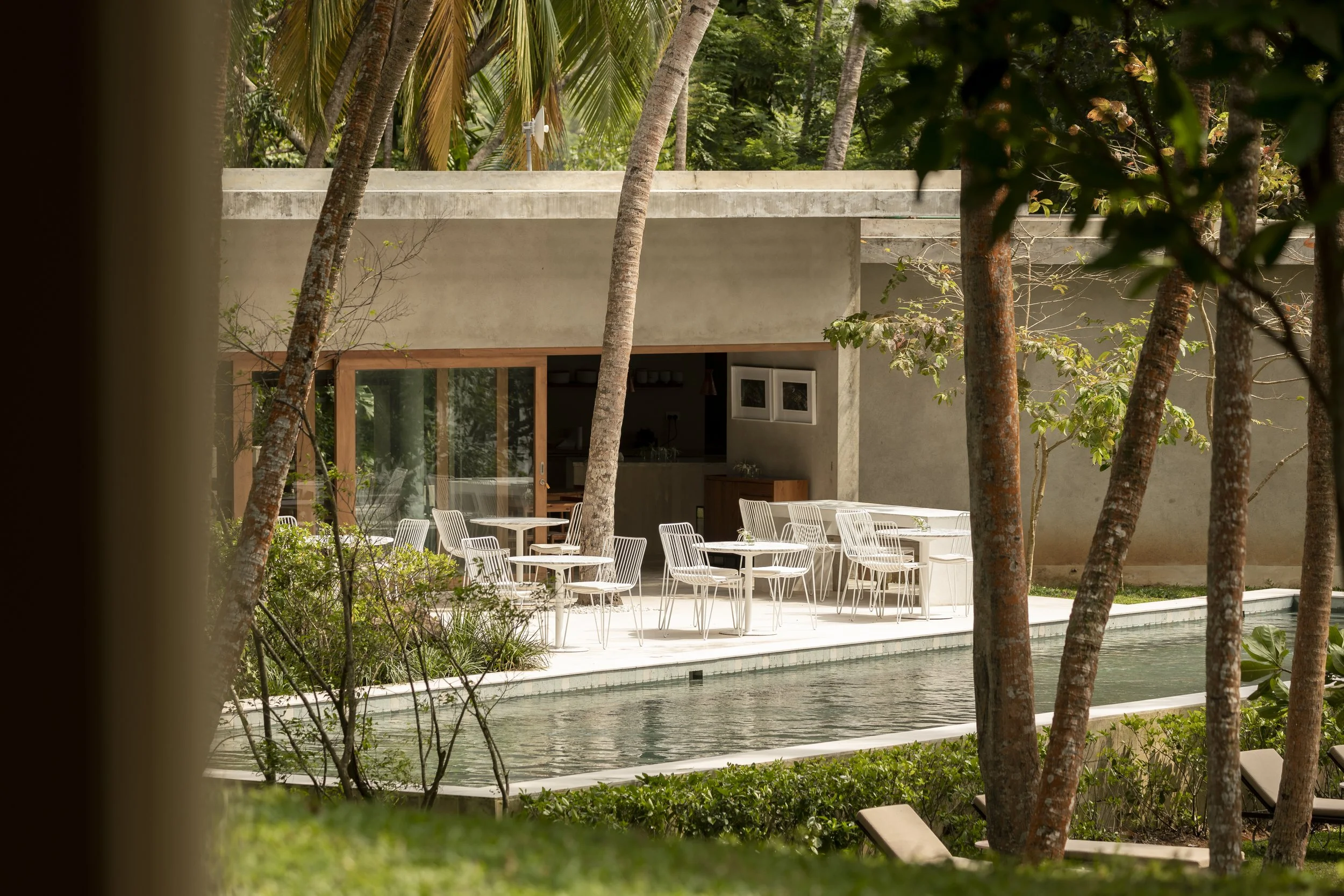 Villa terrace among the palms at Kurulu Bay