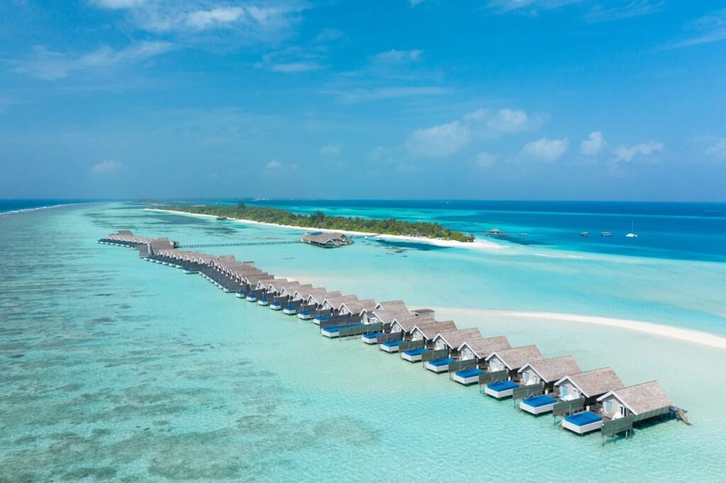 Aerial view of the overwater villas at LUX South Ari Atoll