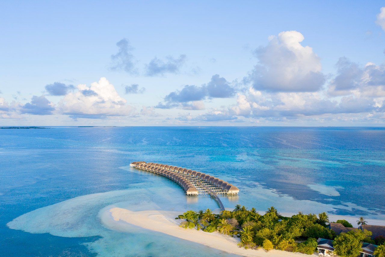 Aerial view of the island and jetty at LUX South Ari Atoll
