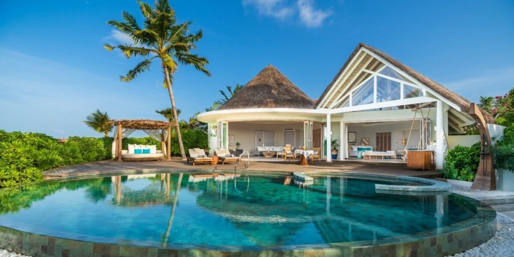 Beach villa and pool at Milaidhoo Island