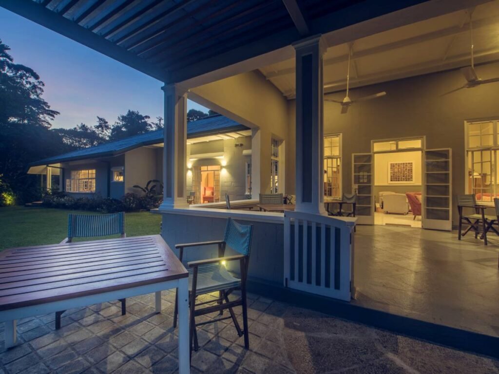 Colonial veranda and dining table at Nine Skies, Ella