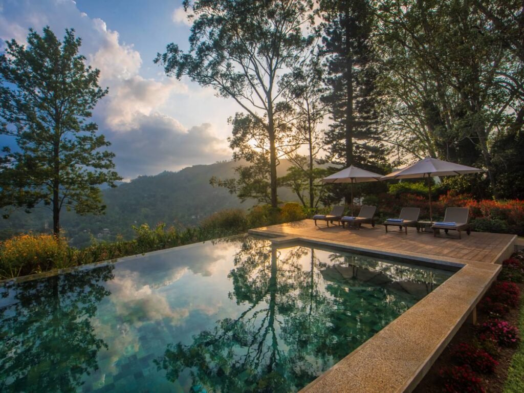 Pool overlooking misty hills at Nine Skies, Ella