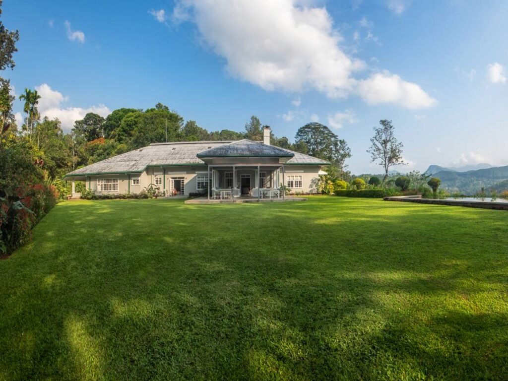 Colonial bungalow and lawn at Nine Skies, Ella