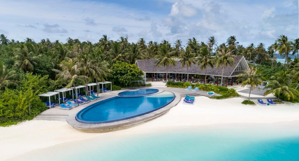 Aerial view of the beach pool and villas at Niyama Private Islands