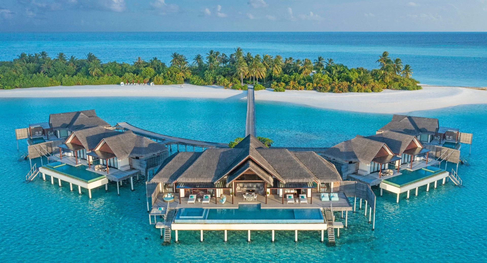 Aerial view of the jetty and overwater villas at Niyama Private Islands