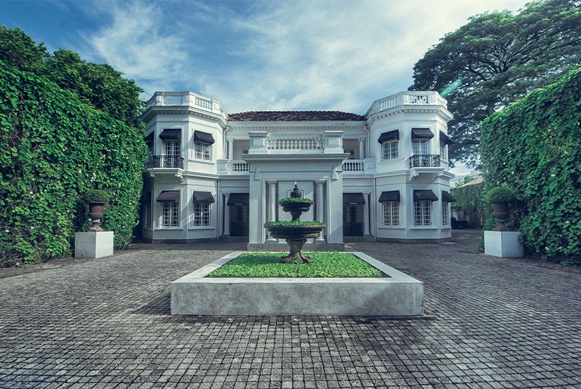 Colonial mansion and fountain courtyard at Paradise Road Tintagel, Colombo