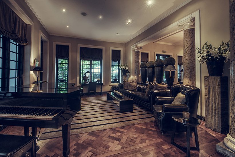 Drawing room with a grand piano at Paradise Road Tintagel Colombo