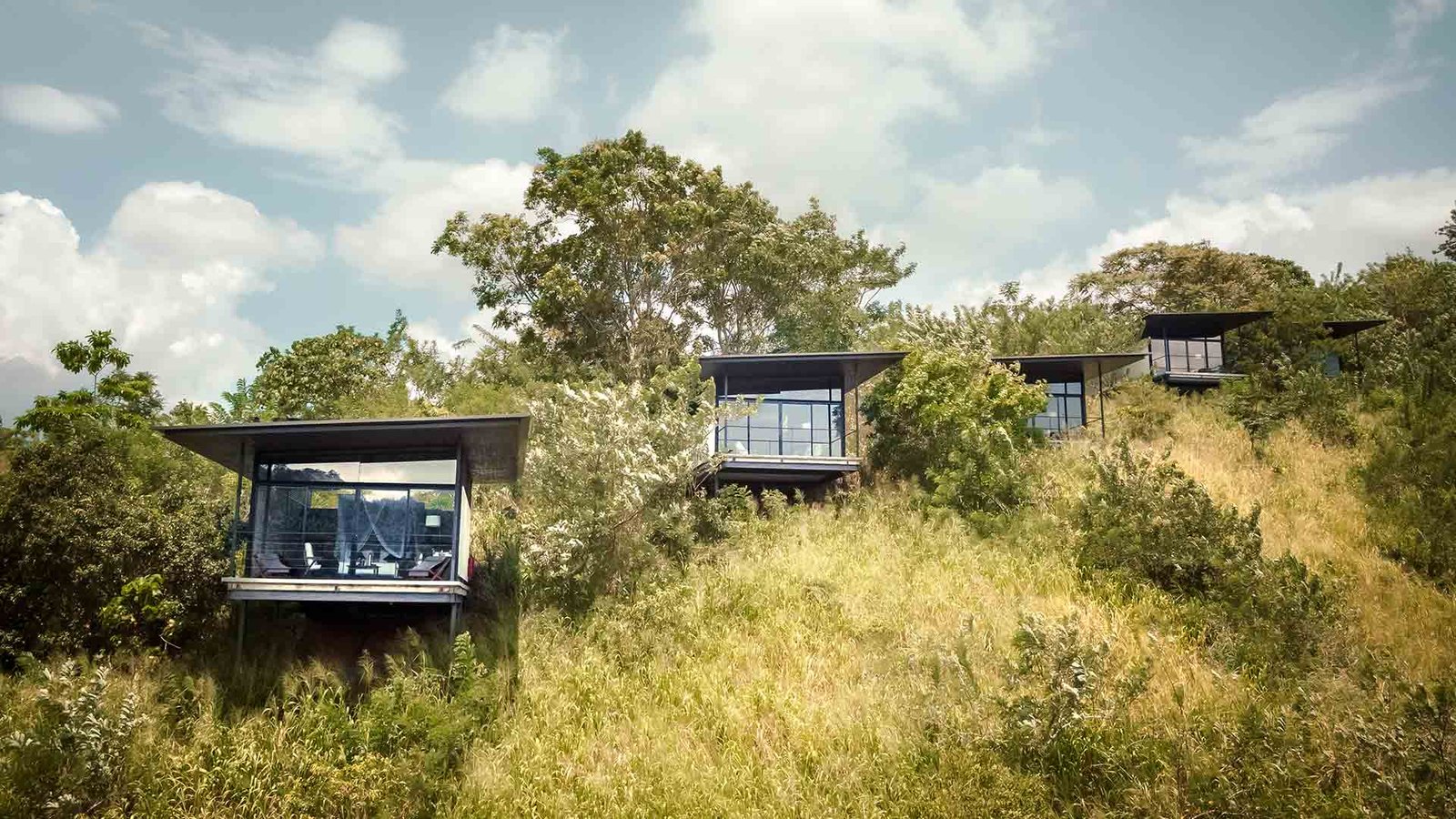 Chalets on the hillside at Santani Wellness Kandy