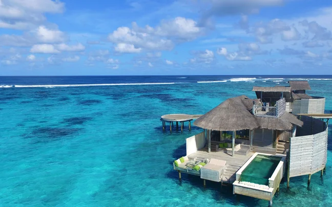 Overwater villas above the reef at Six Senses Laamu