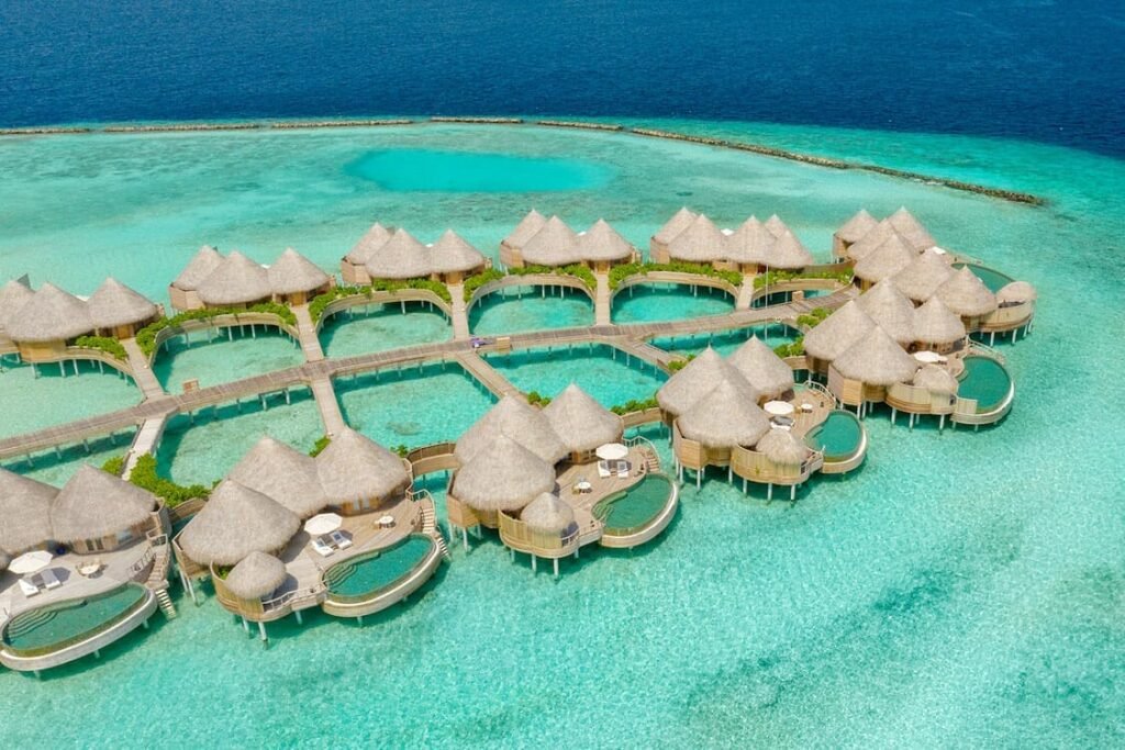 Aerial view of the overwater houses at The Nautilus Maldives