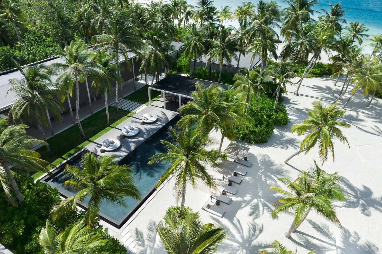 Aerial view of a beach villa and pool at The Ritz-Carlton Maldives, Fari Islands