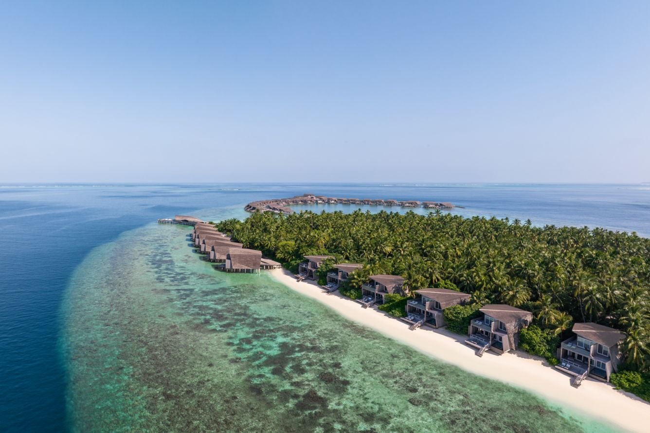 Aerial view of the island and villas at The St. Regis Maldives Vommuli Resort