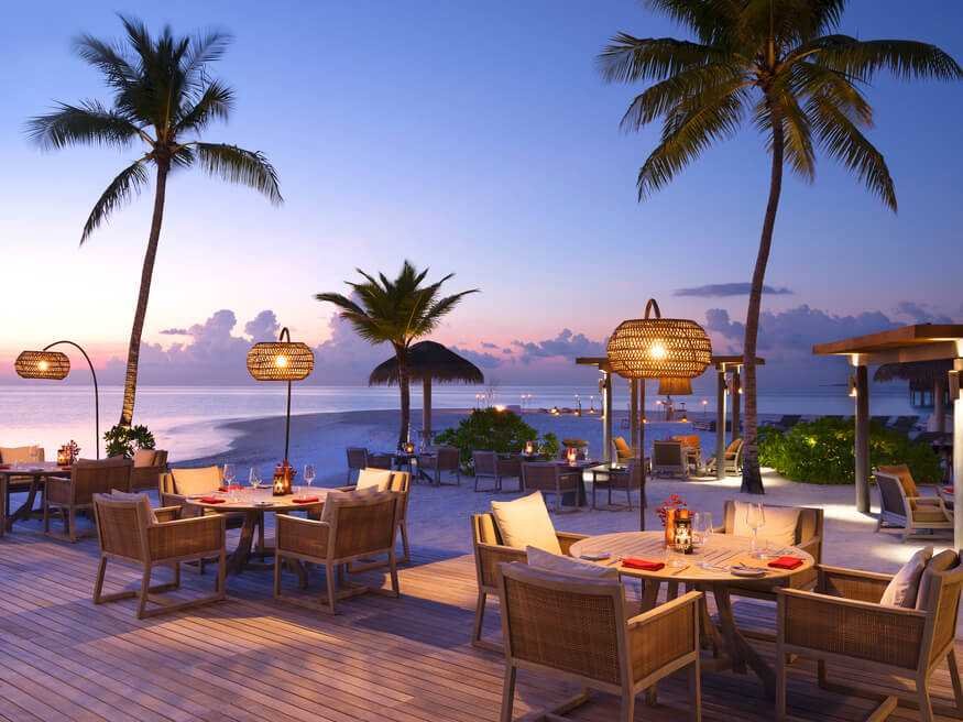 Beach restaurant at sunset at Vakkaru Maldives