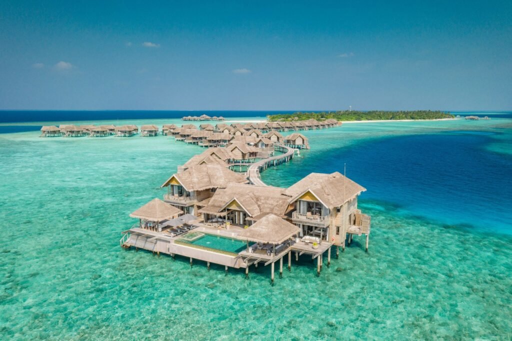 Overwater villas above the reef at Vakkaru Maldives