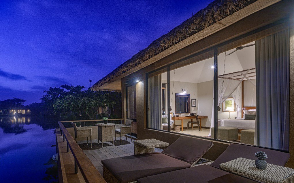 Villa lounge at night at Water Garden Sigiriya