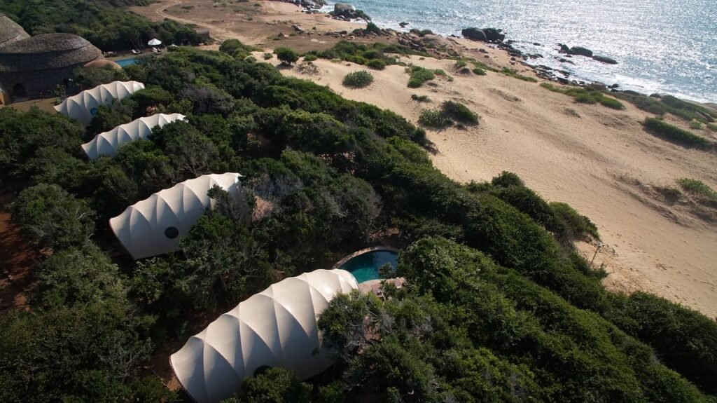Tented suites on a dune above the beach at Wild Coast Tented Lodge, Yala